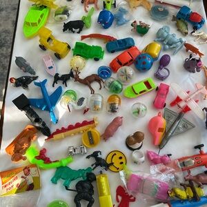 Vintage gumball machine/Cracker Jack plastic toys.Colorful Assorted of mixed toy